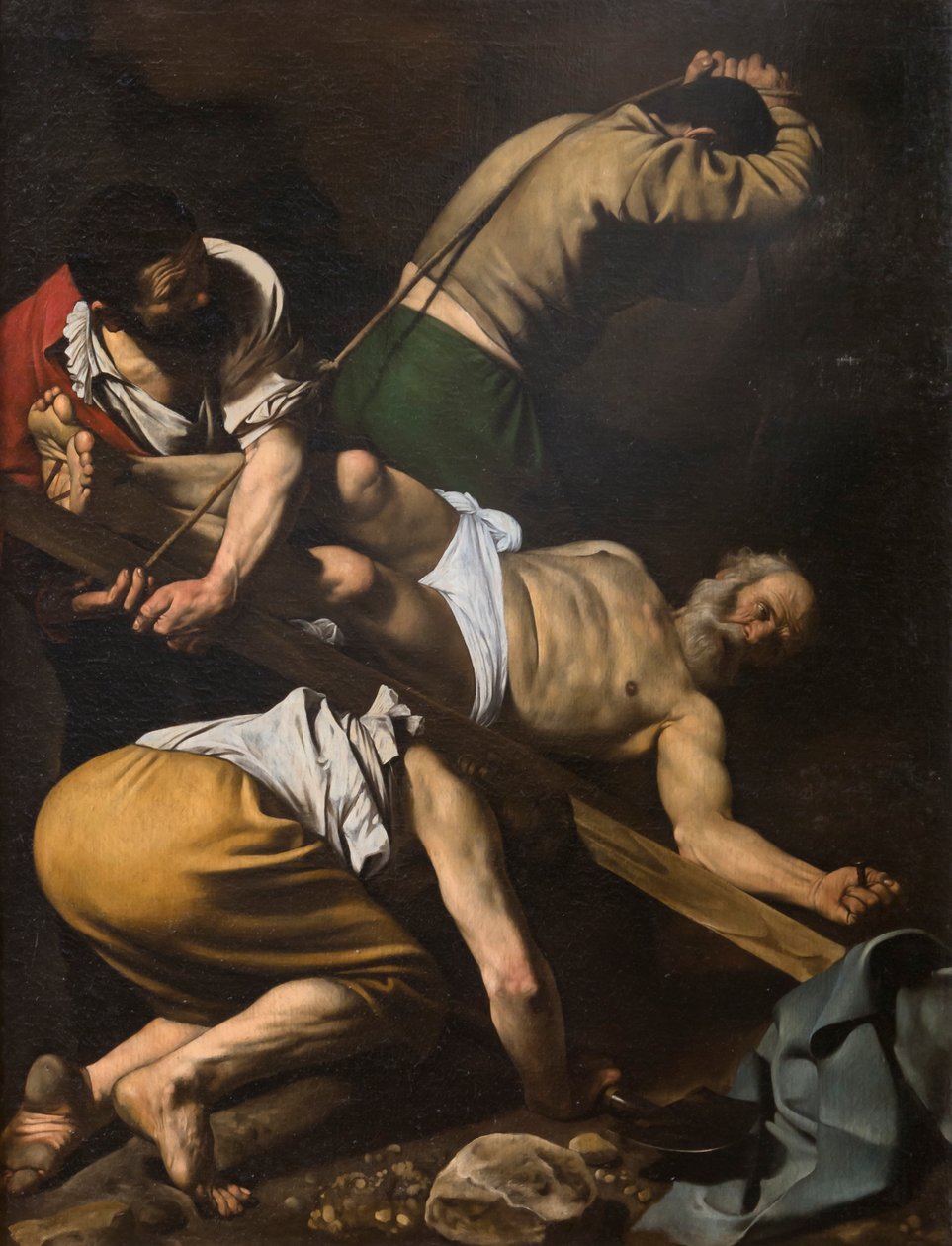 Ukrzyżowanie świętego Piotra autorstwa Michelangelo Merisi da Caravaggio