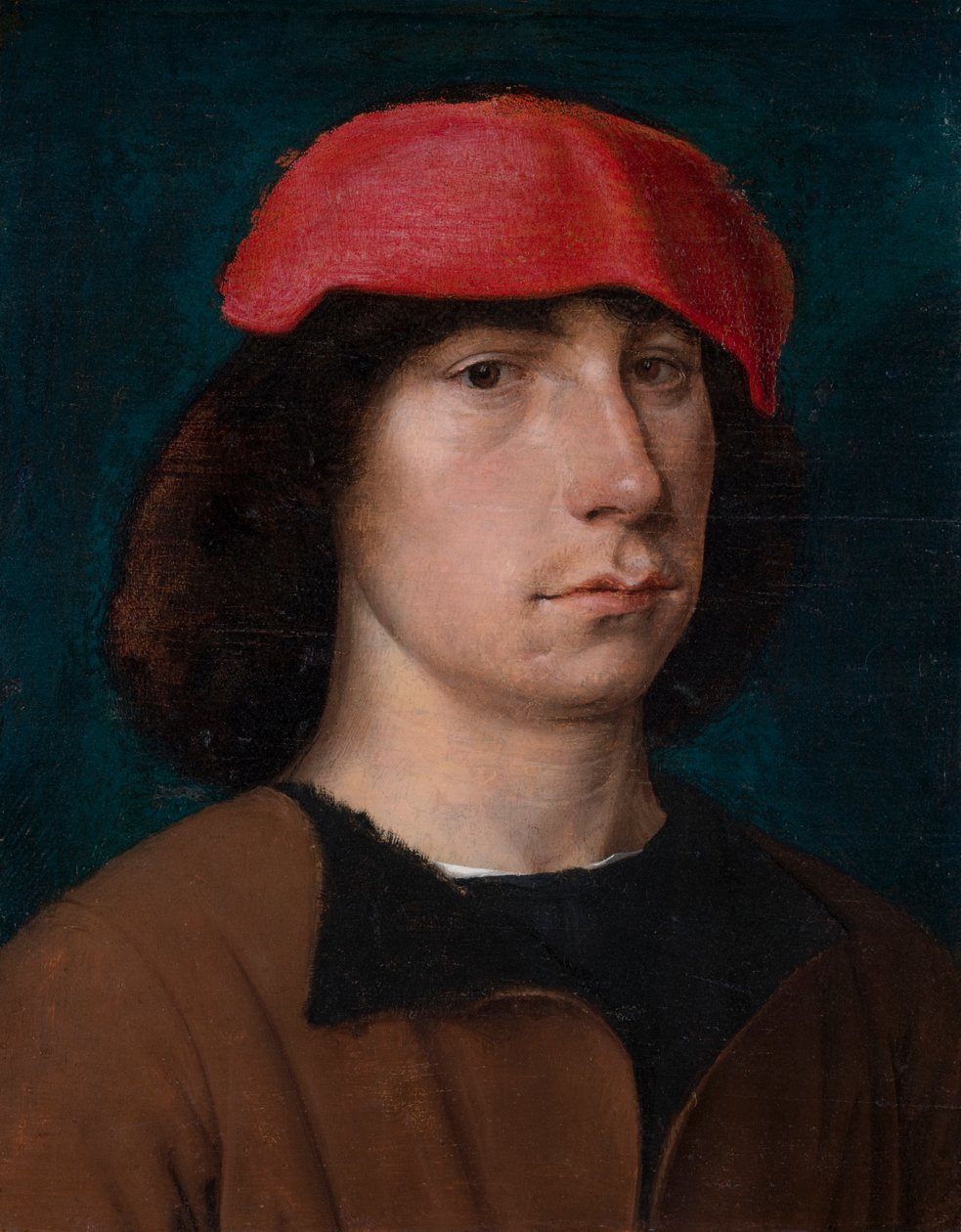 Młody mężczyzna w czerwonej czapce, ok. 1512 (olej na desce dębowej) autorstwa Michiel Sittow