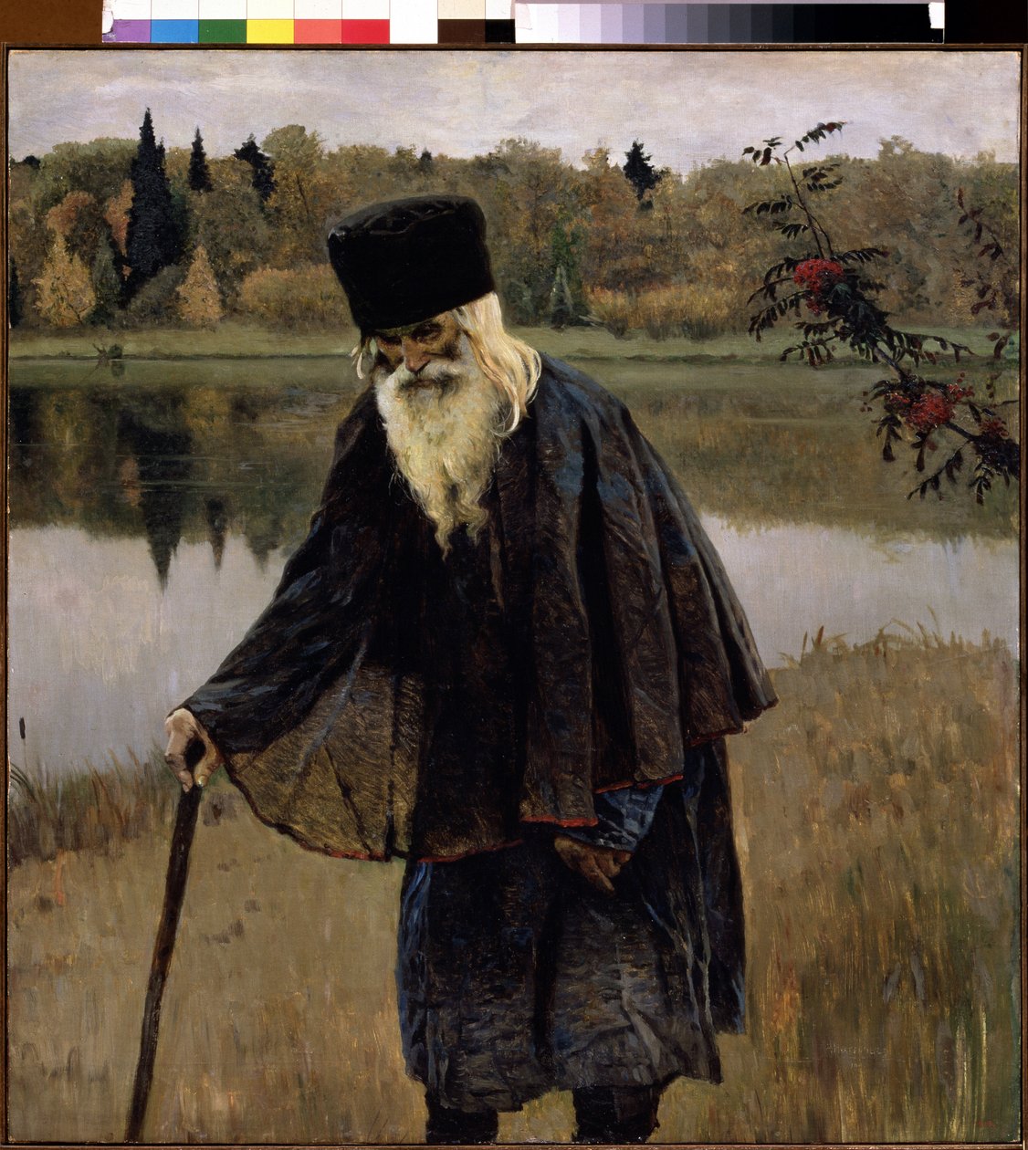 Pustelnik (Pustelnik). Starzec z brodą i siwymi włosami idzie, pochylony nad laską, brzegiem jeziora. Obraz Michaiła Wasiljewicza Niestierowa (1862-1942), olej na płótnie autorstwa Mikhail Vasilievich Nesterov