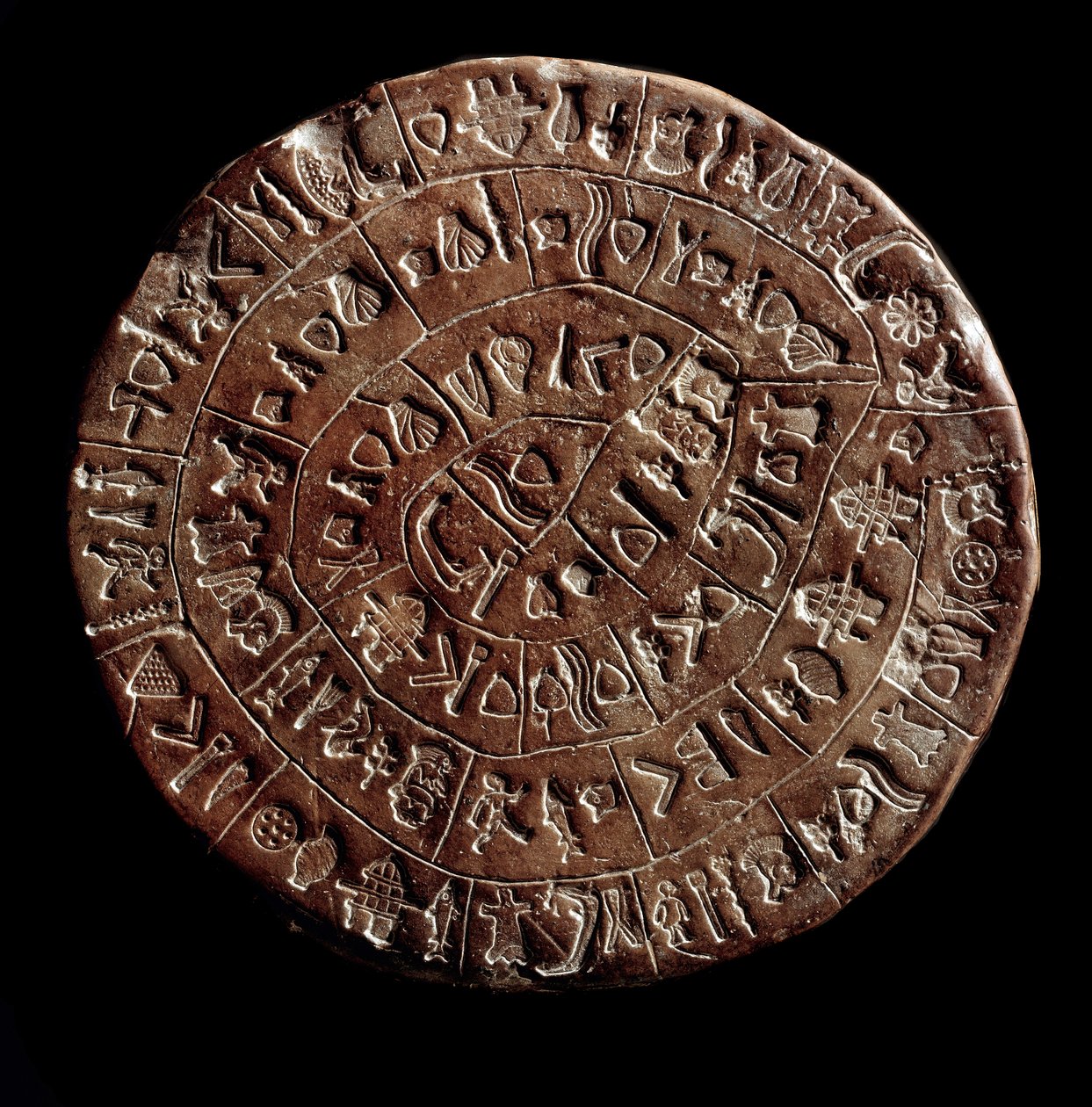 Dysk Fajstos (Dysk Fajstos, Dysk Fajstos) (sztuka minojska - 1700 - 1600 pne) pokryty hieroglifami. autorstwa Minoan