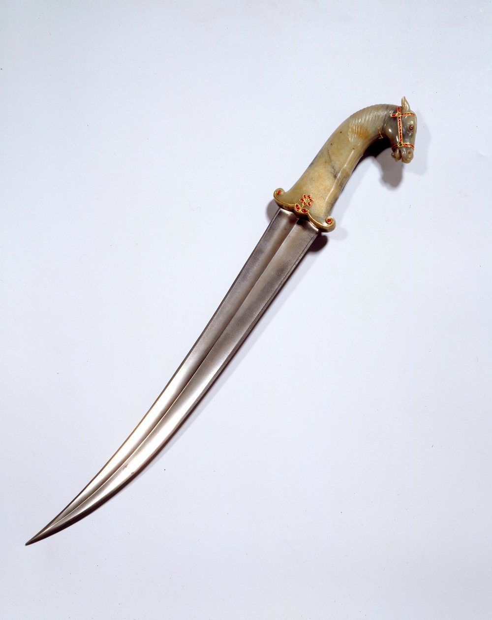 Sztuka Mogołów: sztylet z głową konia ze stali damasceńskiej. XVII wiek. Słońce 0,5 m Paryż, Musee du Louvre autorstwa Mughal School