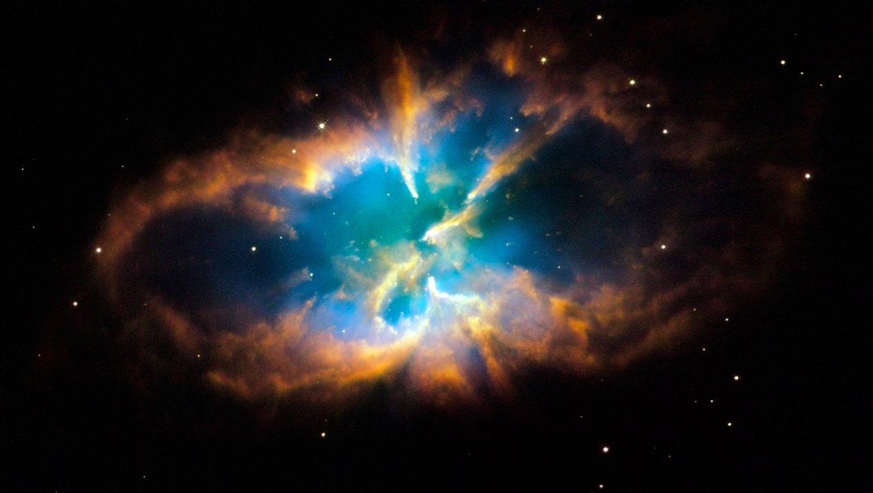 Mgławica planetarna NGC 2818 w południowej konstelacji Pyxis (Kompas). Świecące warstwy i otoczka gazu powstały, gdy gwiazda zrzuciła swoje zewnętrzne warstwy w kosmos po wyczerpaniu się nuklearnego f autorstwa National Aeronautics and Space Administration National Aeronautics and Space Administration