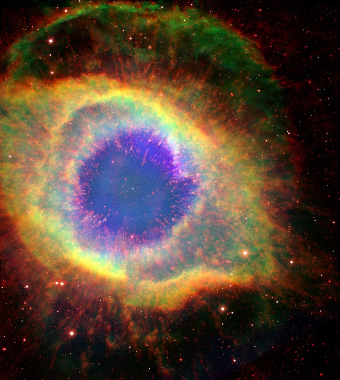 Mgławica Ślimak (NGC 7293), czasami nazywana Okiem Boga, duża mgławica planetarna w konstelacji Wodnika. Źródło: NASA. autorstwa National Aeronautics and Space Administration National Aeronautics and Space Administration