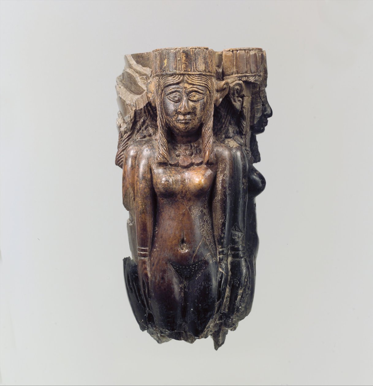 Rękojeść wachlarza lub trzepaczki w kształcie czterech postaci kobiecych, ok. VIII-VII w. p.n.e. (kość słoniowa) autorstwa Neo Assyrian