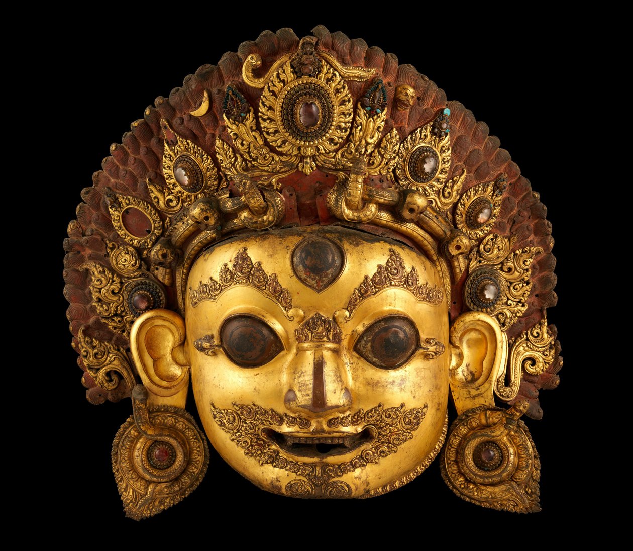 Głowa Bhairawy, ok. XVI w. (malowana złocona miedź i kryształ górski) autorstwa Nepalese School