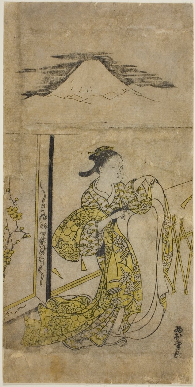 Kobieta trzymająca kimono na górze Fuji autorstwa Nishimura Shigenaga