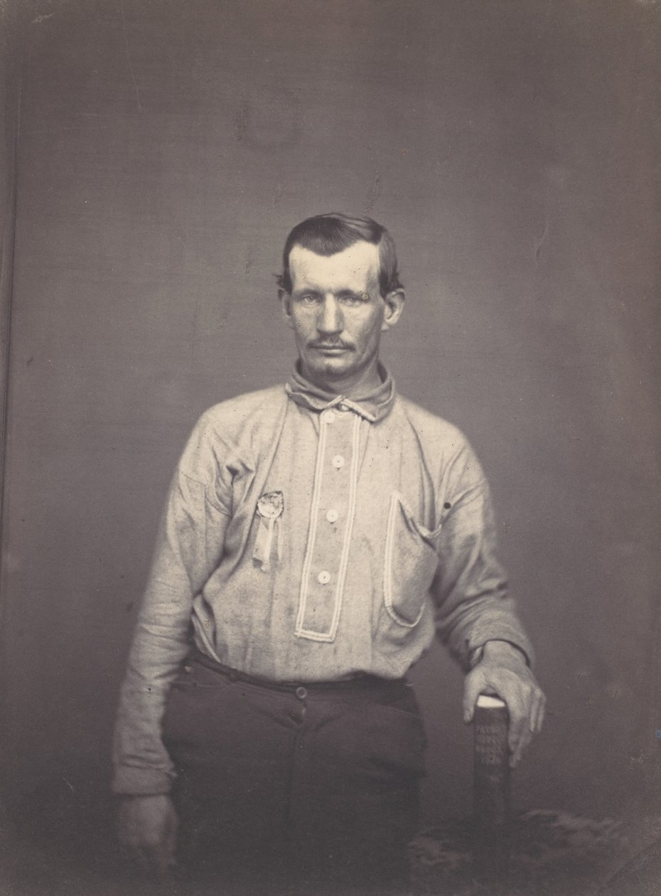 Człowiek posiadający Księgę Urzędu Patentowego, ca. 1857. autorstwa Oliver H. Willard.