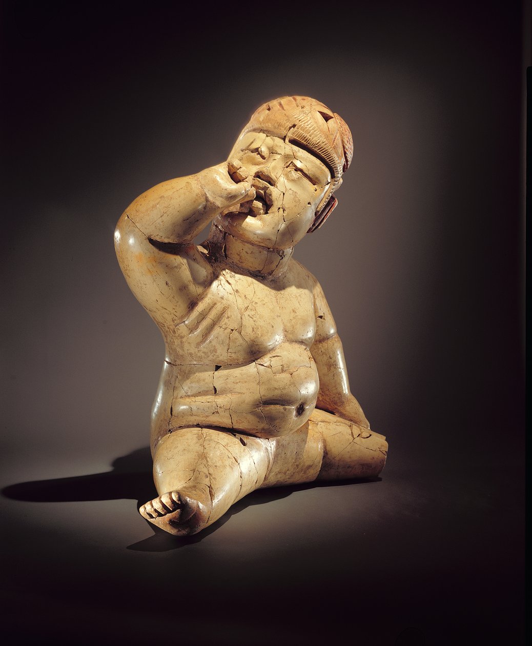Figurka dziecka (ceramika, cynober i czerwona ochra) autorstwa Olmec