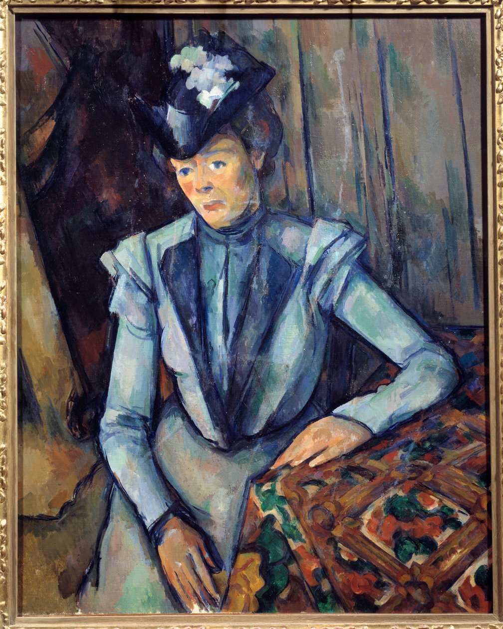 Kobieta w kolorze niebieskim. Obraz Paula Cezanne