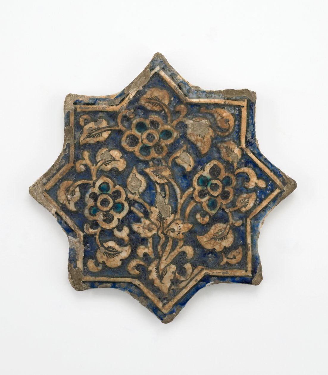 Płytka w formie ośmioramiennej gwiazdy, okres Il-Khanid, 1256-1335 (pasta kamienna, formowana i malowana pod przezroczystą glazurą) autorstwa Persian School