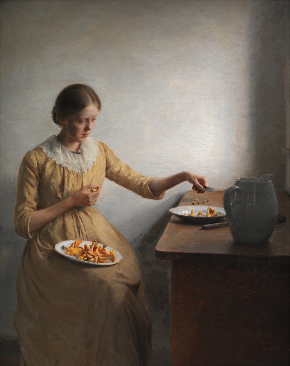 Młoda dziewczyna przygotowująca kurki autorstwa Peter Vilhelm Ilsted