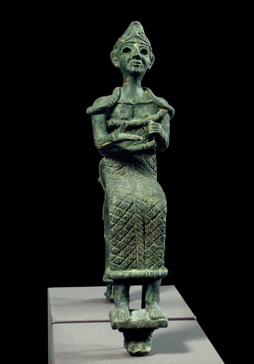 Orientalna sztuka starożytności: statuetka siedzącej bogini. Rzeźba z brązu. Rzeźba Fenicji, około 1300 pne. Paryż, Musee du Louvre autorstwa Phoenician