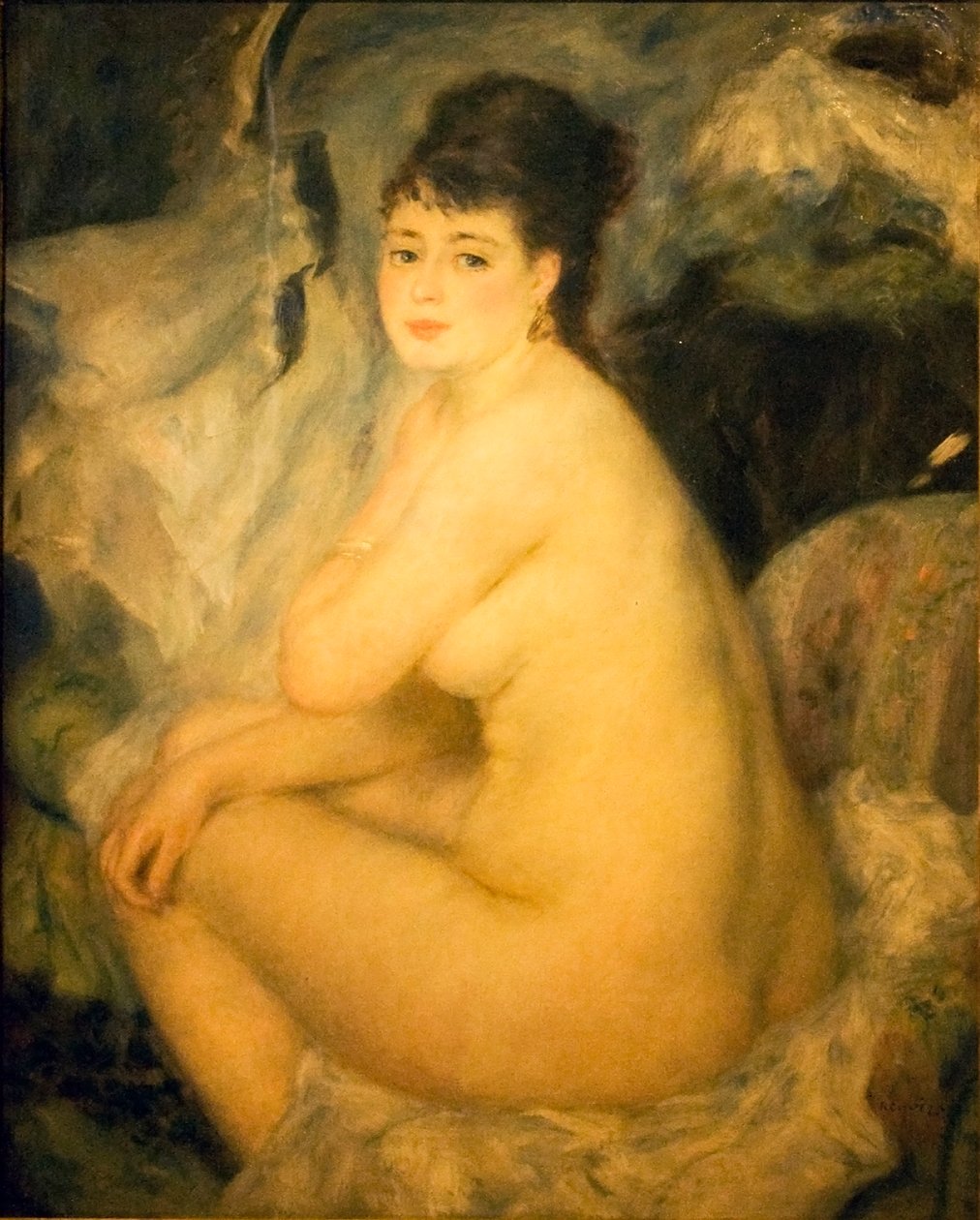 Naga kobieta siedzi na kanapie Annan autorstwa Pierre Auguste Renoir