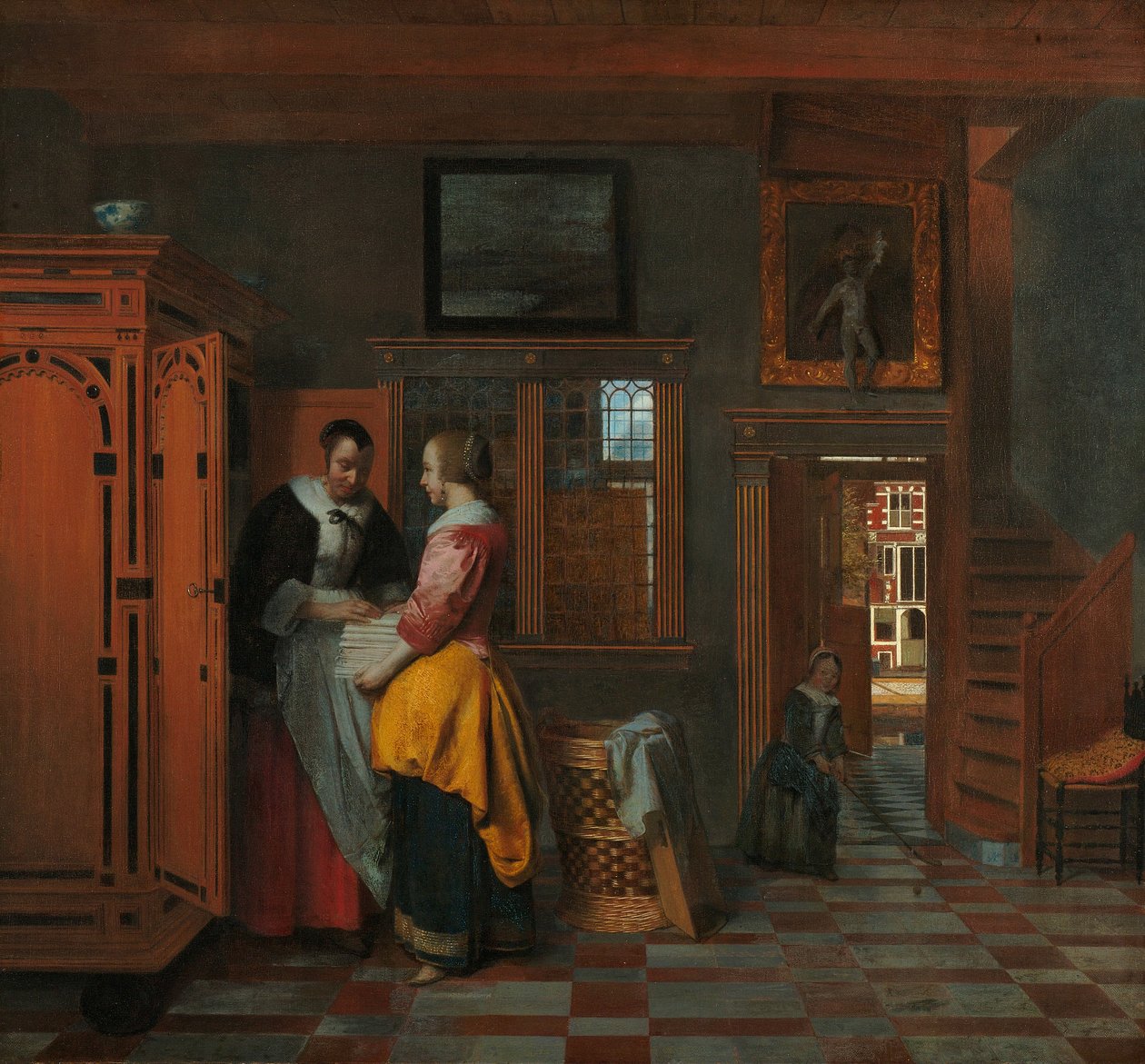Wnętrze z kobietami obok lnianej szafki autorstwa Pieter de Hooch