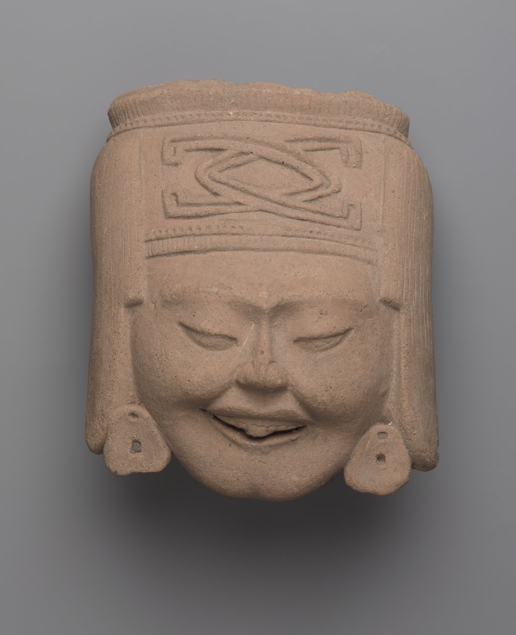 Głowa śmiejącej się kobiety, Totonac (ceramika) autorstwa Pre Columbian