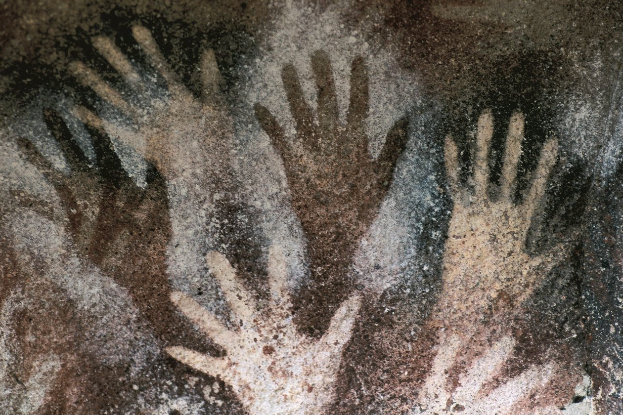 Sztuka naskalna prehistorii: jaskinia ze śladem rąk. Neolit, Jaskinia Dłoni. Argentyna, Santa Cruz autorstwa Prehistoric Prehistoric
