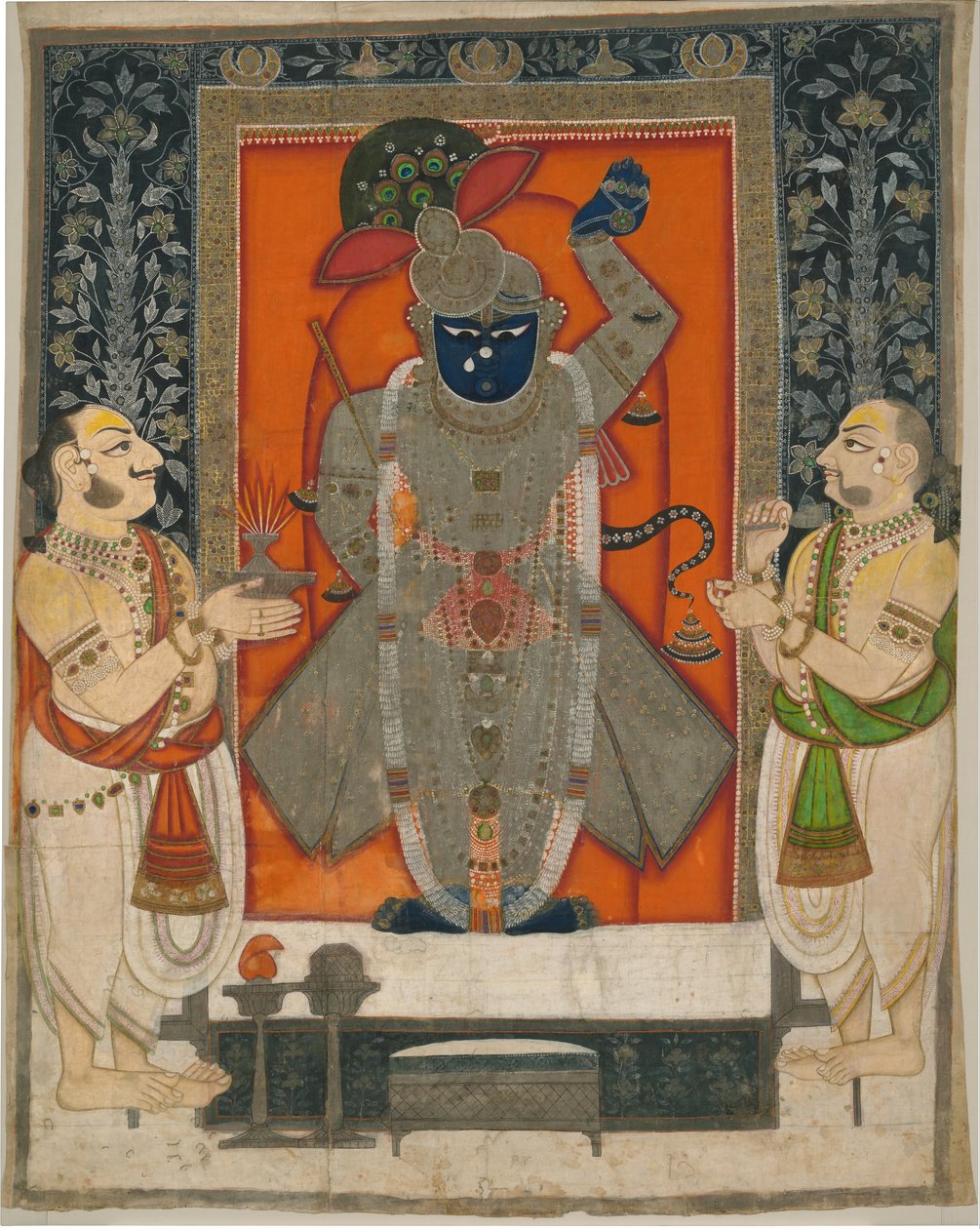 Kapłani czczący Krysznę jako Shrinathji na festiwal Mountain of Food [Annakuta utsava]; wiszące kapliczki [pichhavai] autorstwa Rajasthan Kota school