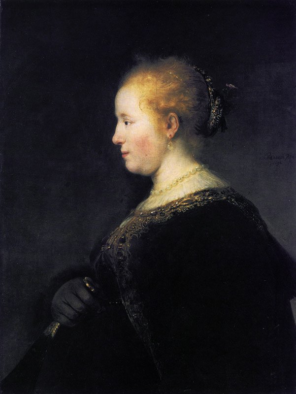Młoda kobieta w profilu z fanem autorstwa Rembrandt van Rijn