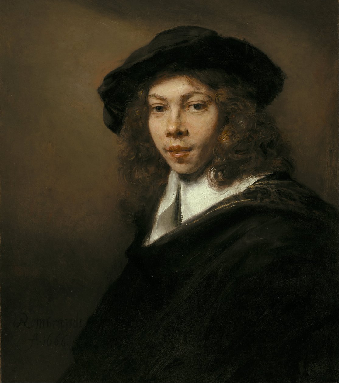 Młody mężczyzna w czarnym berecie autorstwa Rembrandt van Rijn
