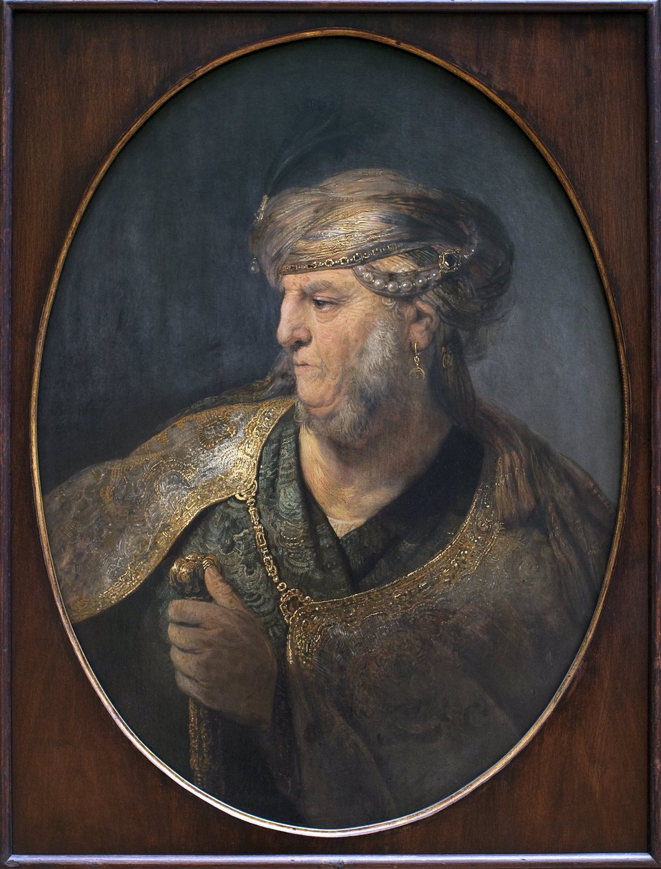 Portret mężczyzny w orientalnym stroju. Obraz Rembrandta Harmenszoon van Rijn (1606-1669), olej na płótnie autorstwa Rembrandt van Rijn