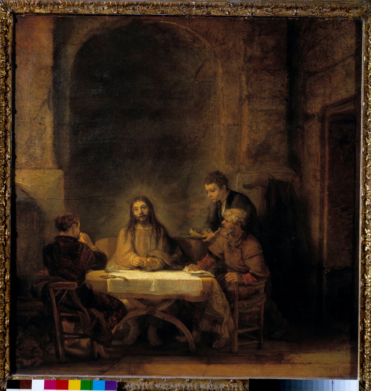 Pielgrzymi z Emaus Chrystus ukazuje się pielgrzymom siedzącym przy stole w karczmie w Emaus. Obraz Harmensza van Rijna dit Rembrandt (1606-1669) 1648 Nd. 0,68x0,65 m - Pielgrzymi w Emaus zwana także Wieczerzą w Emaus. Chrystus ukazujący się pielgrzymom autorstwa Rembrandt van Rijn