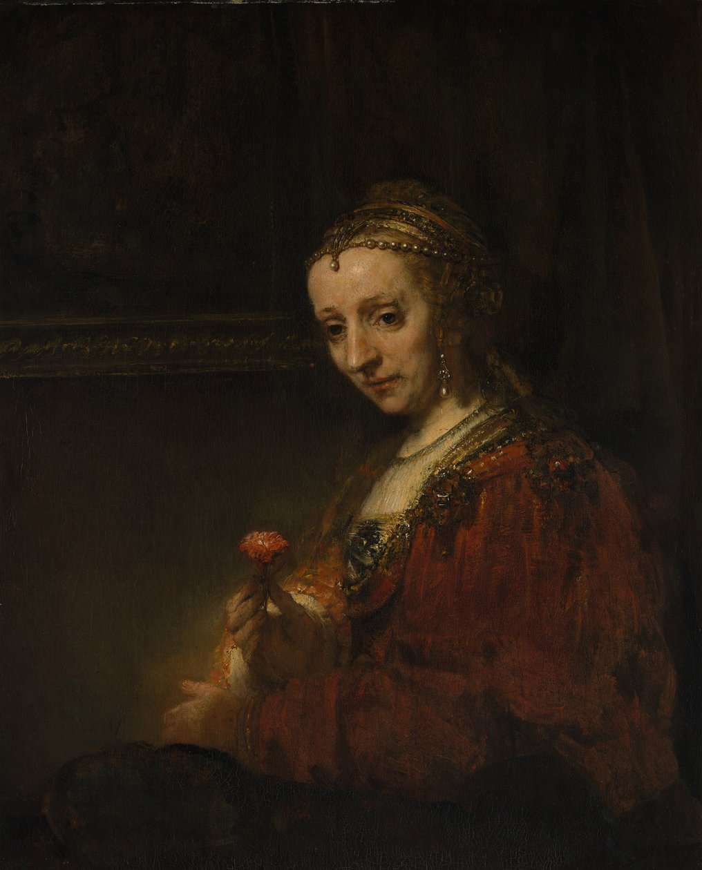 Kobieta z różem, ok. 1660 (olej na płótnie) autorstwa Rembrandt van Rijn