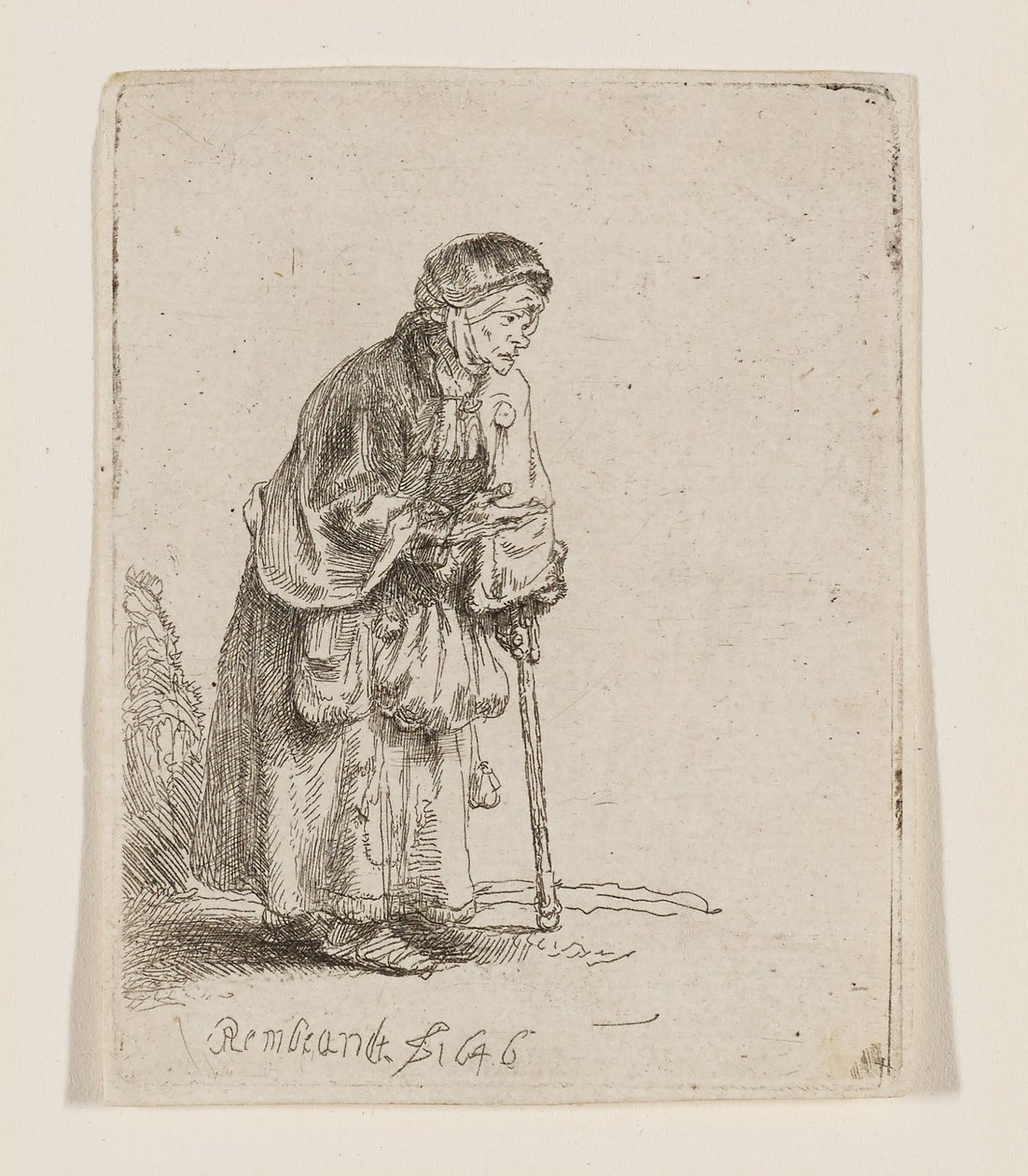 Żebraczka oparta na kiju autorstwa Rembrandt van Rijn