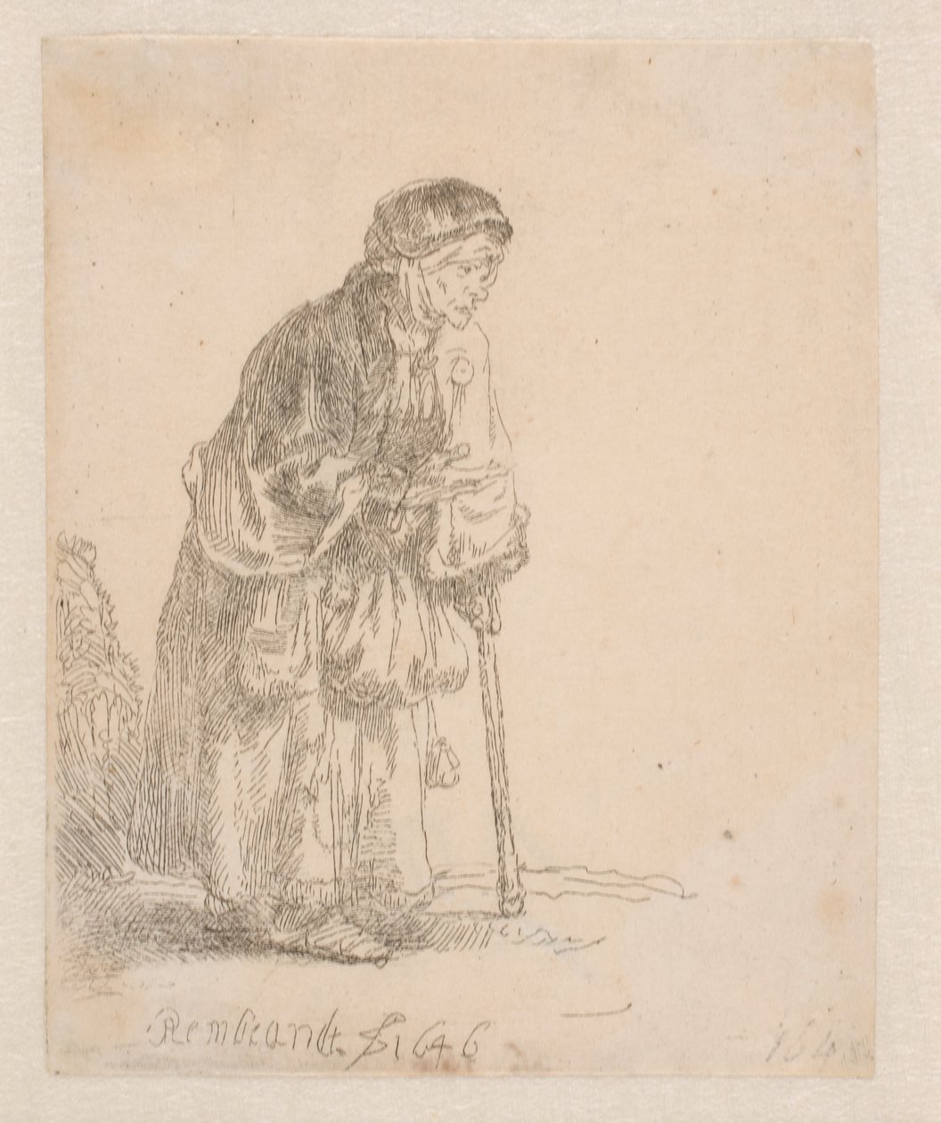 Żebraczka opierająca się na lasce autorstwa Rembrandt van Rijn