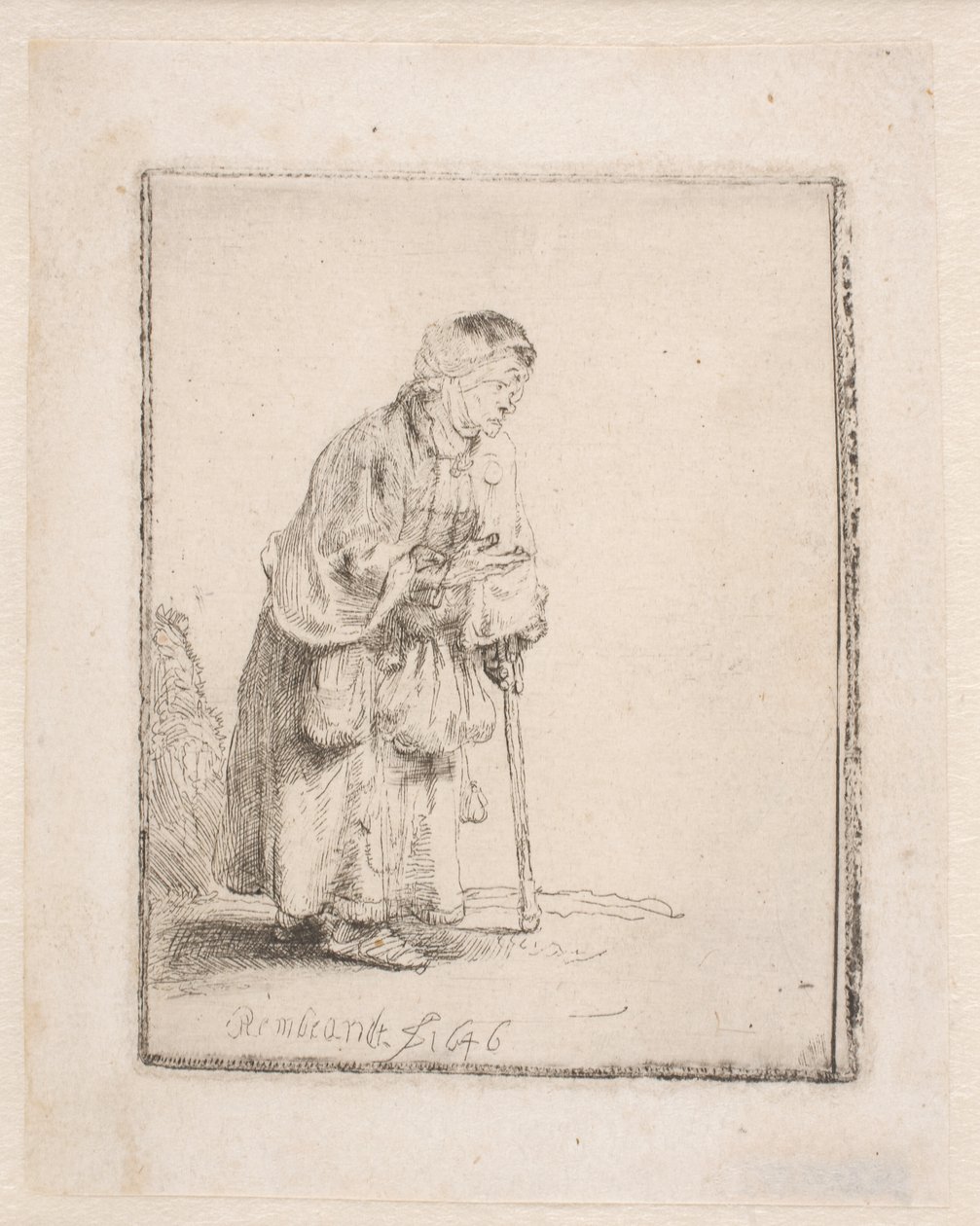 Żebraczka opierająca się na lasce autorstwa Rembrandt van Rijn