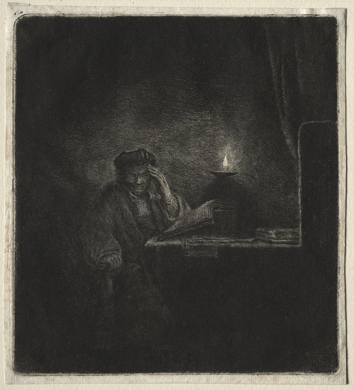 Kopia ucznia przy stole przy świecach autorstwa Rembrandt van Rijn