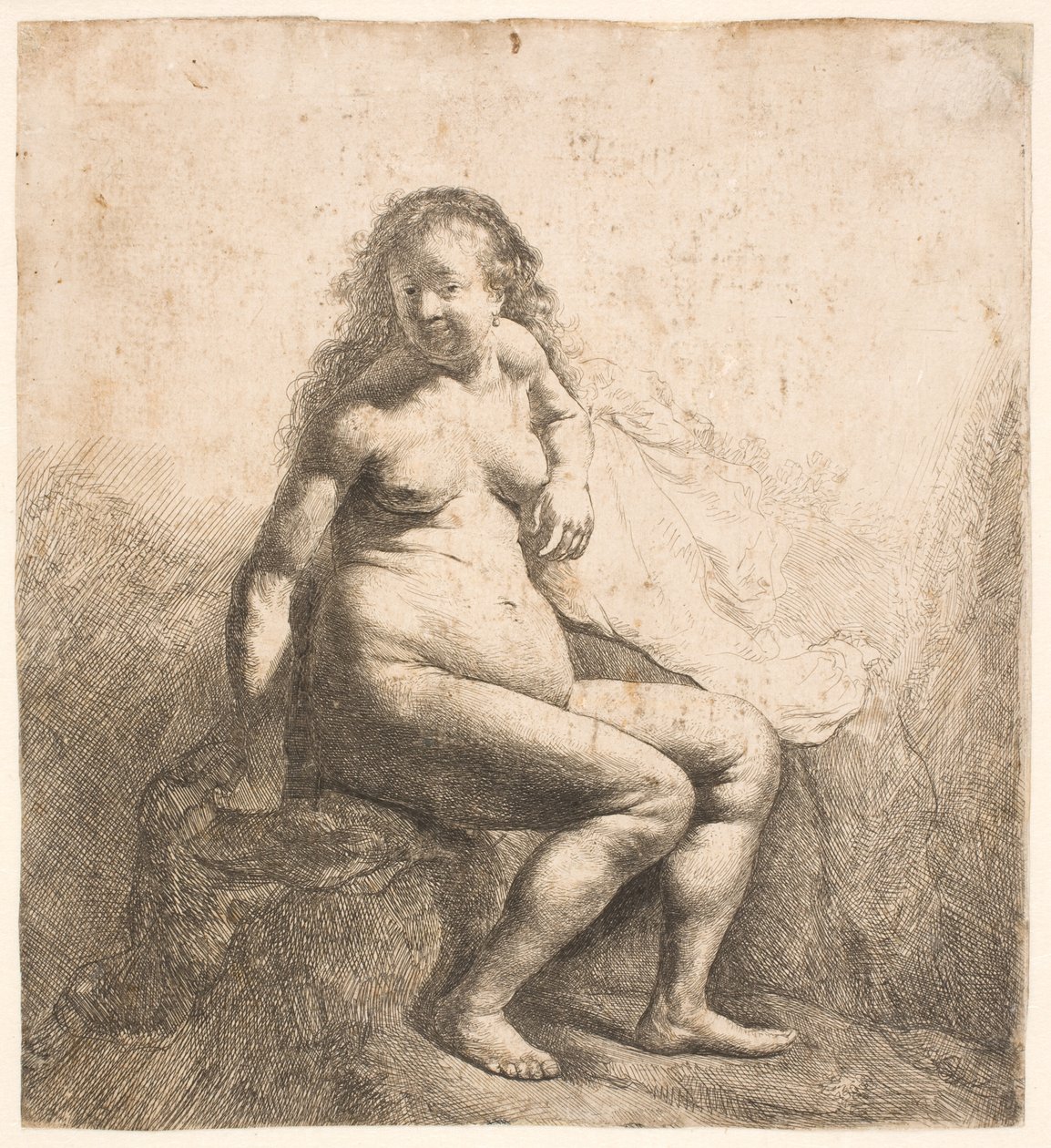 Naga kobieta siedząca na pagórku autorstwa Rembrandt van Rijn