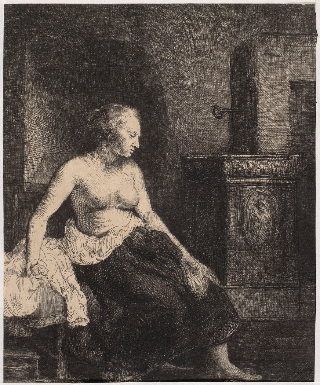Półobnażona kobieta siedząca przy piecu autorstwa Rembrandt van Rijn