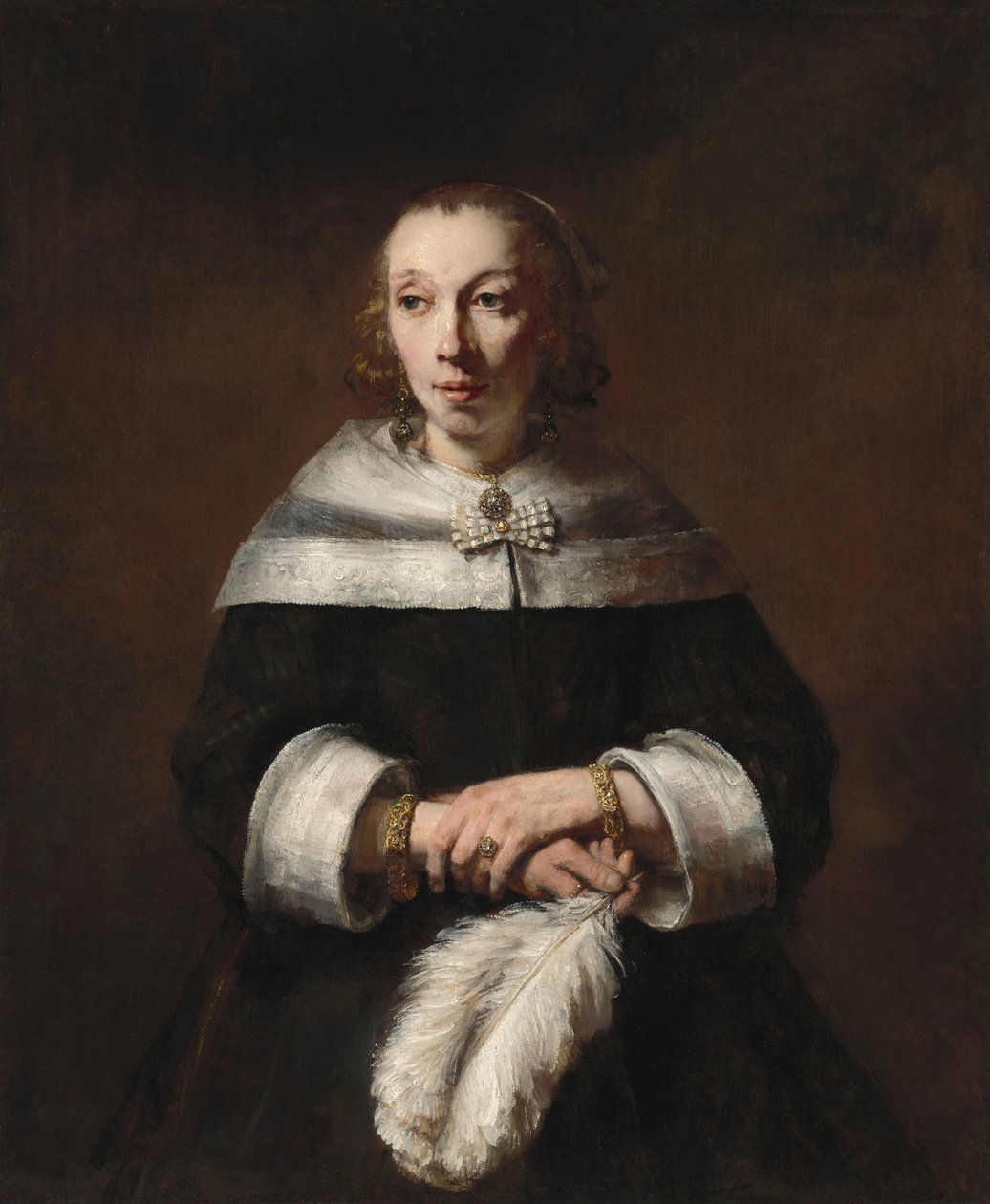 Portret damy ze strusim wachlarzem autorstwa Rembrandt van Rijn
