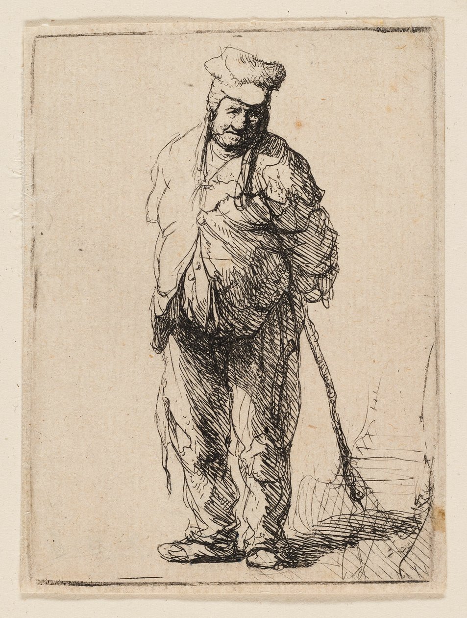Obdarty chłop z rękami za sobą, trzymający kij autorstwa Rembrandt van Rijn