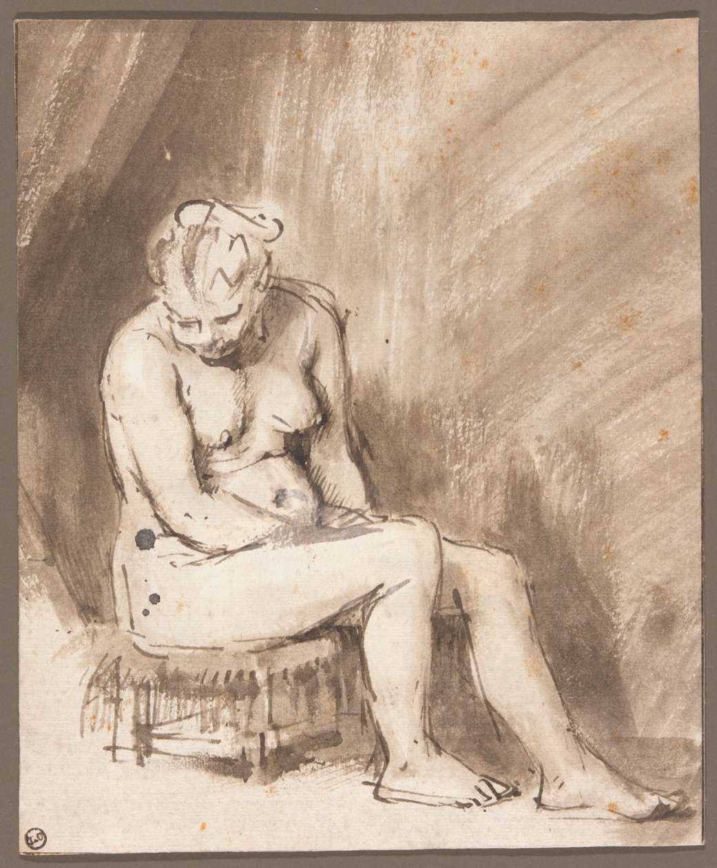 Akt kobiecy w pozycji siedzącej autorstwa Rembrandt van Rijn