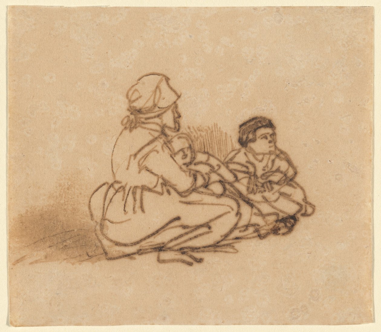 Kobieta siedząca na ziemi z dwójką dzieci autorstwa Rembrandt van Rijn