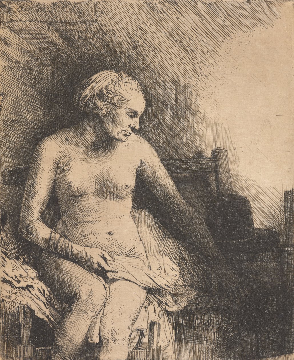 Kobieta w łaźni z kapeluszem leżącym obok niej autorstwa Rembrandt van Rijn