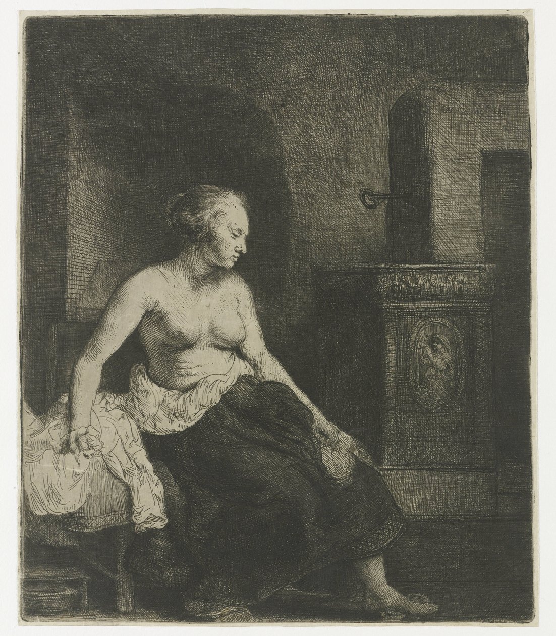 Kobieta siedzi na wpół ubrana obok pieca autorstwa Rembrandt van Rijn