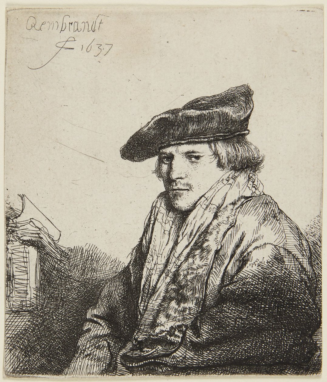 Młody mężczyzna w czapce autorstwa Rembrandt van Rijn