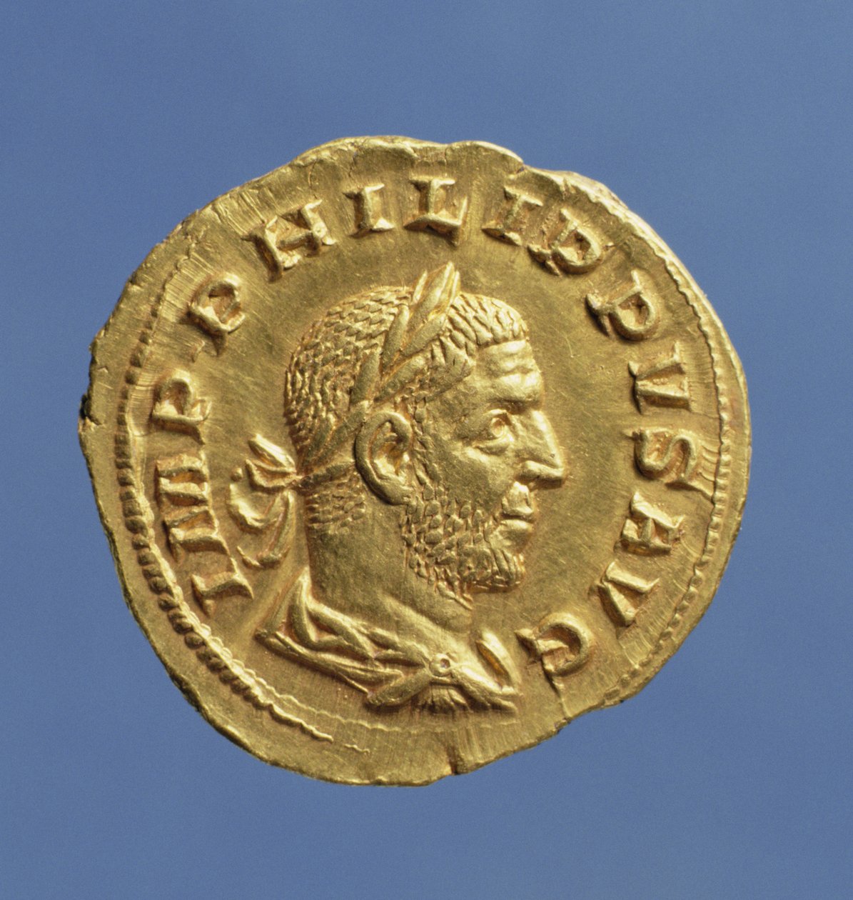 Aureus (awers) Filipa Araba (244-249) udrapowany, z pancerzem, ubrany w wieniec laurowy. Napis: IMP PHILIPPVS AVG (złoty) autorstwa Roman