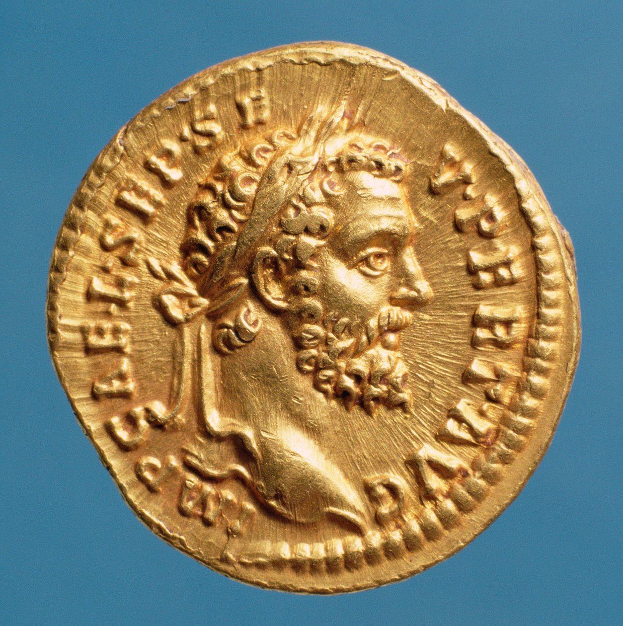 Aureus (awers) Septymiusza Sewera (193-211) w wieńcu laurowym. (złoto) Inskrypcja: IMP CAE L SEP SEV PERT AVG autorstwa Roman