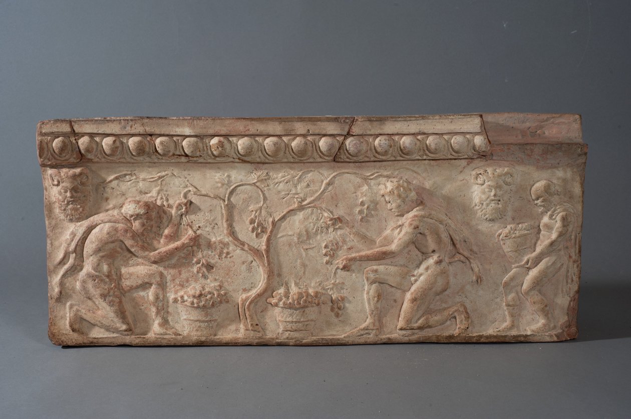 Tablica z satyrami zbierającymi winogrona (terakota) autorstwa Roman
