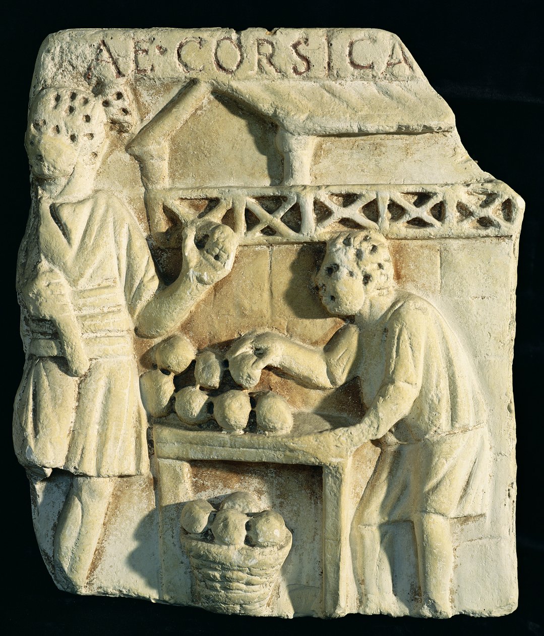 Relief przedstawiający sprzedawcę chleba autorstwa Roman