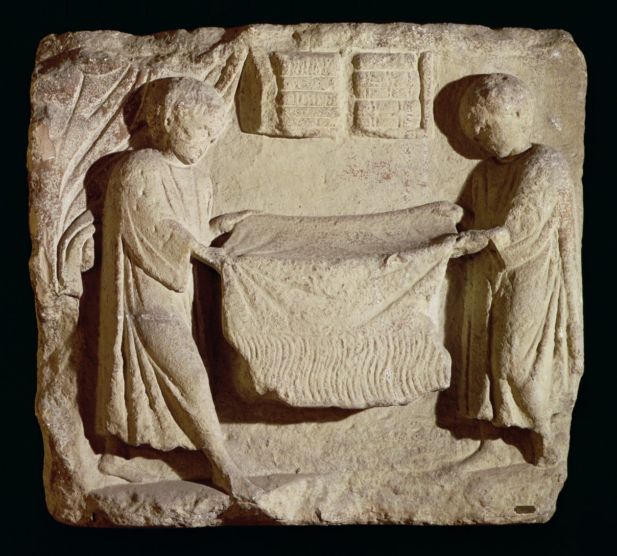Relief przedstawiający drapera w jego sklepie autorstwa Roman