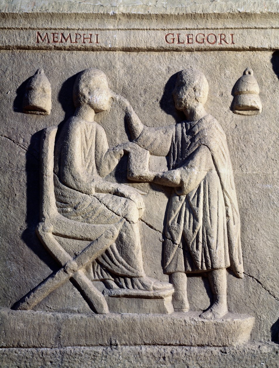 Okulista bada oczy pacjenta (Dolna płaskorzeźba, II w.) autorstwa Roman