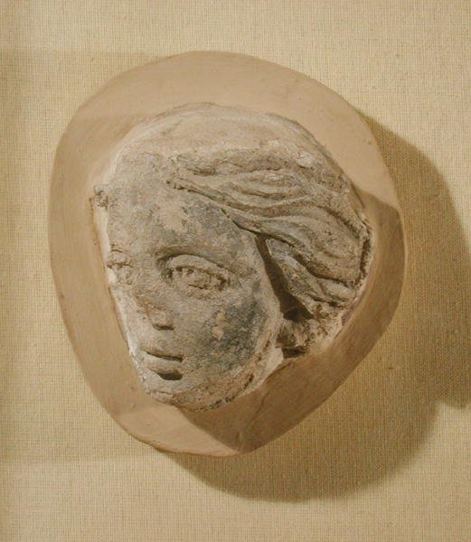 Relief przedstawiający głowę kobiety, z Tunezji (stiuk) autorstwa Roman