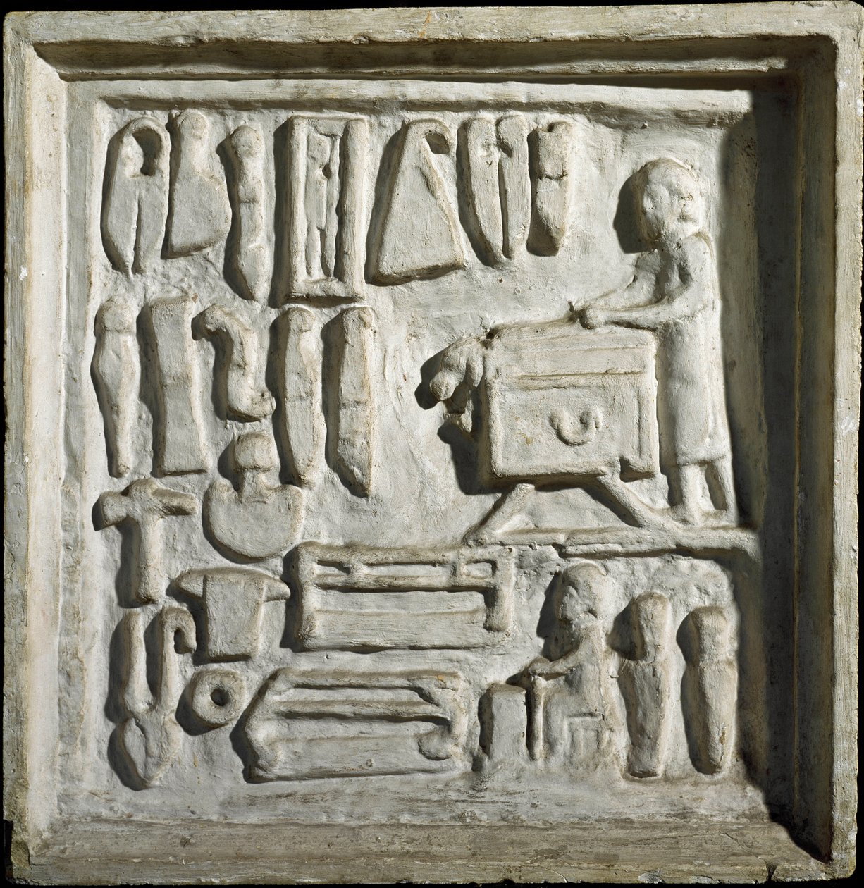 Sztuka rzymska: „”wnętrze budynku lub warsztatu z różnymi narzędziami””” Płaskorzeźba. I wiek naszej ery. Rzym, Museo della Civilta Romana autorstwa Roman