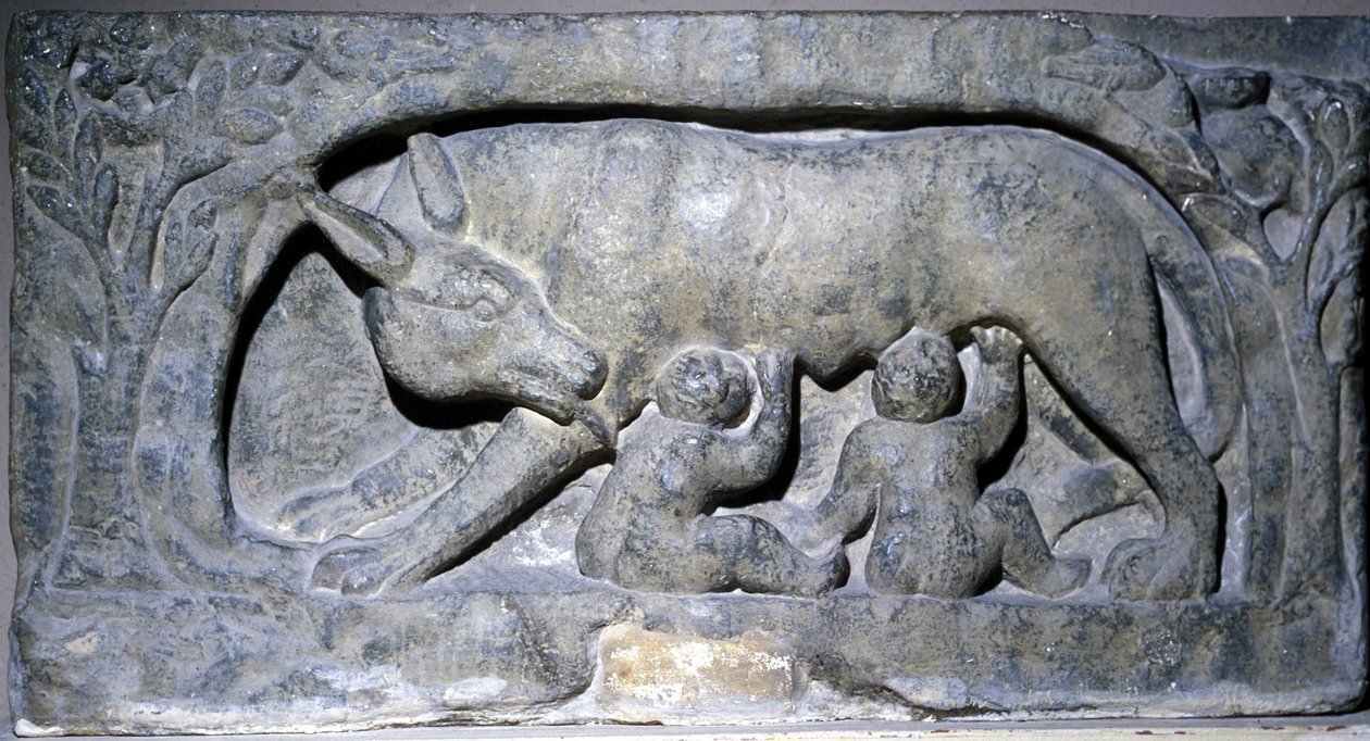 Relief w wapieniu Lupercal (nazwa jaskini w Rzymie): wilk z Romulusem i Remusem, Muzeum Avenches. autorstwa Roman Roman