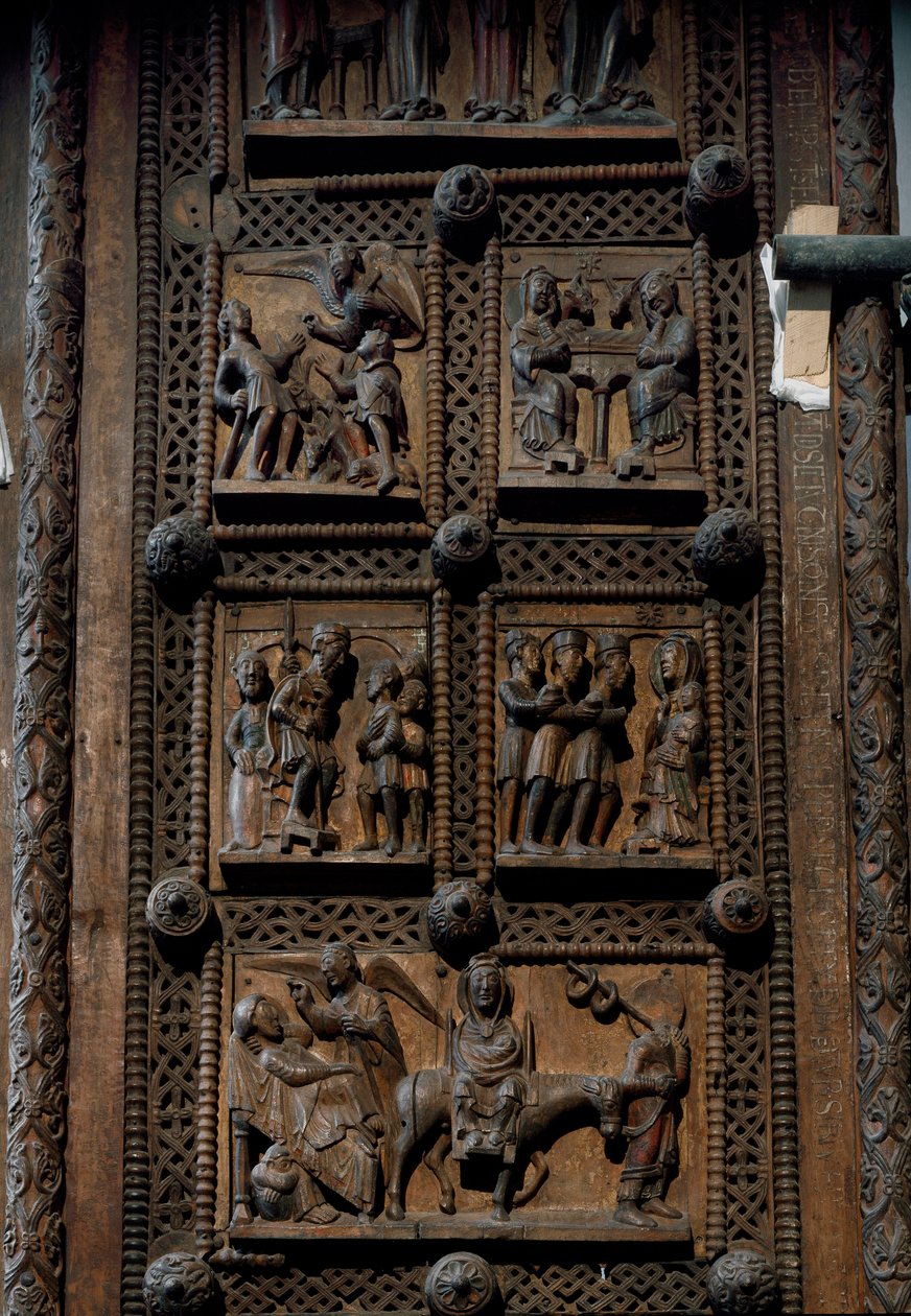 Sztuka romańska: drewniane drzwi z połowy XII wieku kościoła Mariackiego Kapitolu w Kolonii, Niemcy (Sankt Maria im Kapitol, Koln). Sceny przedstawiające zapowiedź pasterzom, szopkę, adorację magów i autorstwa Romanesque