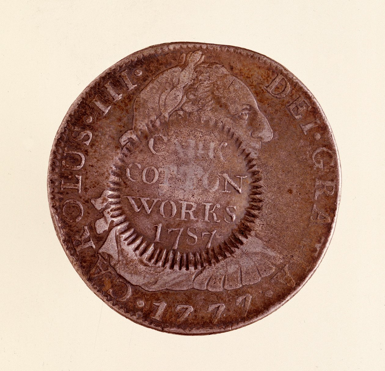 Srebrna moneta (8 reali) z Hiszpanii: panowanie Karola III (1759-1788). 1777 z kontrasygnatem z 1787 r. Śr. 3,9 cm Neapol, muzeum archeologiczne autorstwa Spanish School